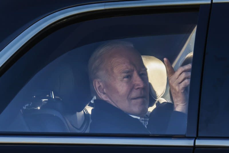 President Joe Biden looks out the window of his limo as he departs after speaking at the Wisconsin Black Chamber of Commerce in Milwaukee on Wednesday. Photo by Tannen Maury/UPI
