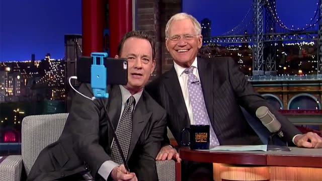 As we near David Letterman's last <em>Late Show</em>, the beloved host has been snapping selfies with his famous friends, and on Monday, Tom Hanks took it to the next level. During his appearance on the CBS show, the 58-year-old actor whipped out a selfie stick for his pic with Letterman. <strong> VIDEO: George Clooney Handcuffs Himself to David Letterman </strong> CBS Hanks quipped that his wife Rita Wilson "announced when they first came out that we would never ever have a selfie stick in the house." However, now they are "all over Florence, which was the birthplace of the Renaissance." The selfie apparatus came highly recommended by Hanks who snapped the pic high enough to hide the men's double chins. "In a couple of weeks when you head down to -- I'm just gonna guess what you're gonna be up to, two words -- Space Camp, take one of these bad boys with you," he encouraged the 68-year-old host. <strong>VIDEO: David Letterman Locks Lips with Julia Roberts! </strong> Letterman's last <em> Late Show </em>is Wednesday, May 20. Here's what you can expect: