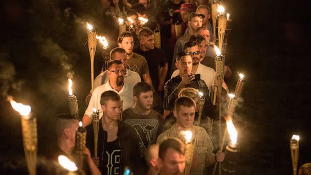 PHOTO: Several hundred white nationalists and white supremacists carrying torches march in a parade through the University of Virginia campus in Charlottesville, Va., Aug. 11, 2017. (Evelyn Hockstein/The Washington Post via Getty Images)