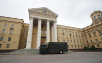 A police armored truck parked in front of the Ministry of Internal Affairs of Belarus in Minsk, Belarus, Wednesday, Aug. 19, 2020. The authoritarian leader of Belarus complained that encouragement from abroad has fueled daily protests demanding his resignation as European Union leaders held an emergency summit Wednesday on the country's contested presidential election and fierce crackdown on demonstrators. (AP Photo/Dmitri Lovetsky)