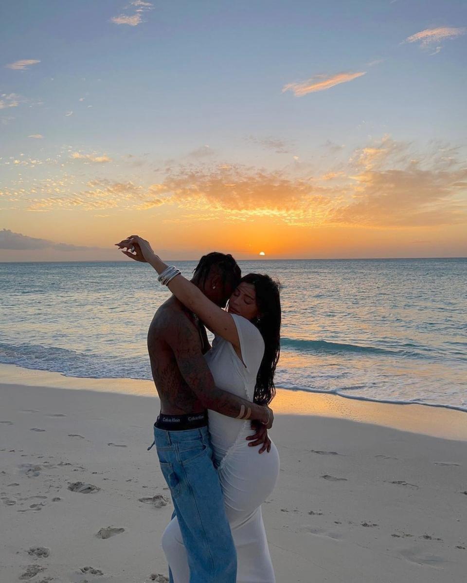 Kylie Jenner and Travis Scott Pose for Romantic Beach Photos and Feed Lizards with Daughter Stormi