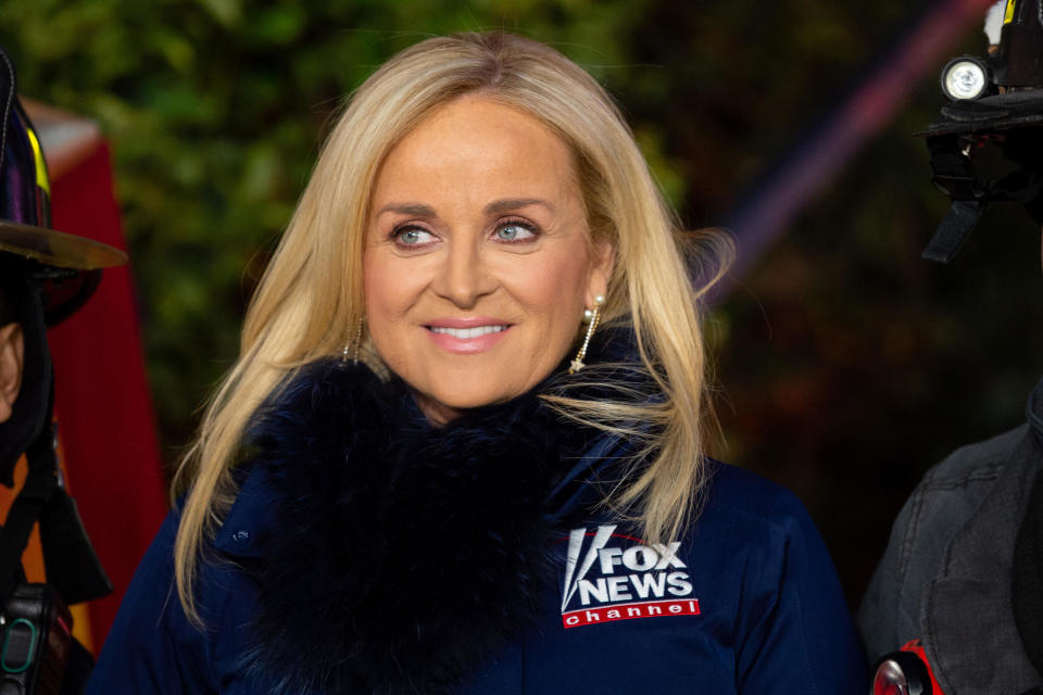 File: Fox News CEO, Suzanne Scott, attends the new All-American Christmas Tree lighting outside News Corporation at Fox Square on December 9, 2021 in New York City.  / Credit: Alexi Rosenfeld / Getty Images