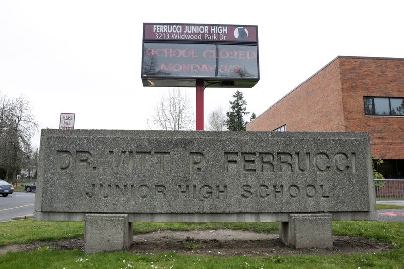 A marquee reading "school closed" is pictured at Ferrucci Junior High School after two schools were closed for cleaning due to flu-like symptoms of a relative in Puyallup