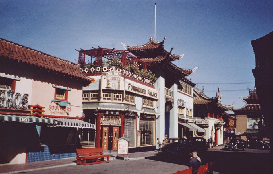 Traditional Chinese-style architecture with "Forbidden Palace" signage and adjacent souvenir shop