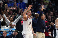 Gonzaga forward Drew Timme gestures to fans as time runs out in the second half of a second-round college basketball game against TCU in the men's NCAA tournament Saturday March 19, 2023 in Denver. (AP Photo/John Leyba)
