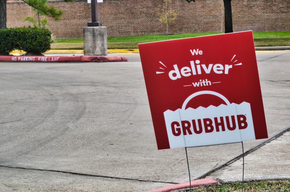 Humble, Texas/USA 01/01/2020: Grubhub sign posted in the ground near some local businesses in Humble, TX. Grubhub is an online fast food delivery service that is becoming increasingly popular in the US.