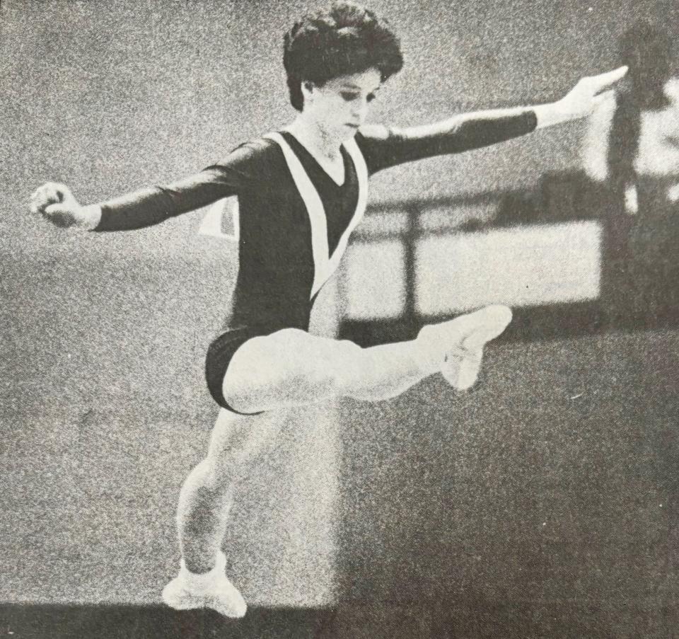 Watertown's Dawn Koehn leaps from the balance beam during the 1989 South Dakota State High School Gymnastics Meet in the Watertown Civic Arena.