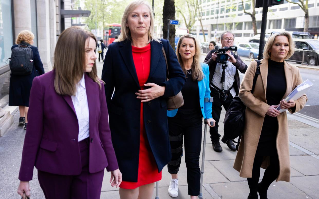 Annita McVeigh, Martine Croxall, Karin Giannone and Kasia Madera arrive at the tribunal