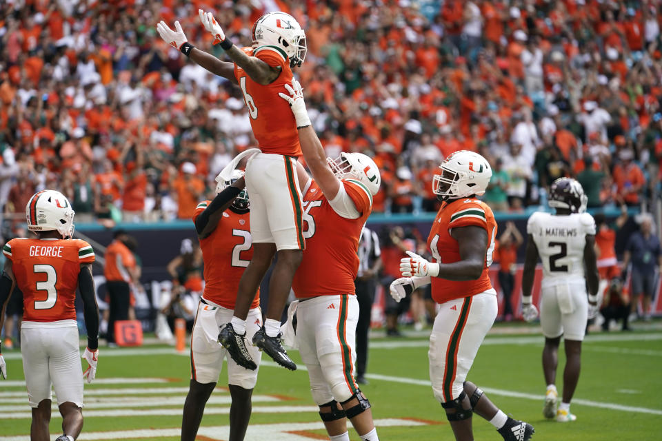 Miami wide receiver Isaiah Horton (16) celebrates after scoring a touchdown during the first half of an NCAA college football game against Texas A&M, Saturday, Sept. 9, 2023, in Miami Gardens, Fla. (AP Photo/Lynne Sladky)