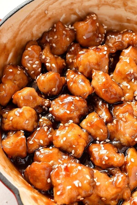 <p>Savory Bites Recipes</p><p>Restaurant-style crispy sesame chicken tossed in homemade sesame sauce topped with some sesame seeds. It's so easy and can be served with rice or noodles.</p><p><strong>Get the recipe: <a href="https://www.savorybitesrecipes.com/2020/03/easy-sesame-chicken.html" rel="nofollow noopener" target="_blank" data-ylk="slk:Easy Sesame Chicken;elm:context_link;itc:0;sec:content-canvas" class="link rapid-noclick-resp">Easy Sesame Chicken</a></strong></p>
