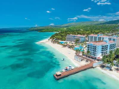 Pictured here, Sandals Dunn’s River in Ocho Rios, Jamaica, where Ian Fleming International Airport (OCJ) made recent headlines after welcoming its first international flight from the US – with daily service coming this winter.