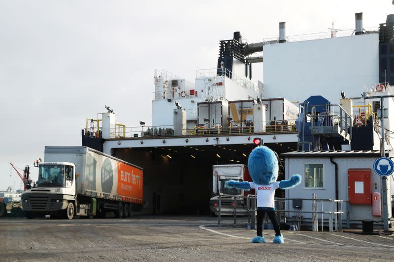 A blue furry monster known as the 'Brexit Monster' makes an appearance in the port of Rotterdam