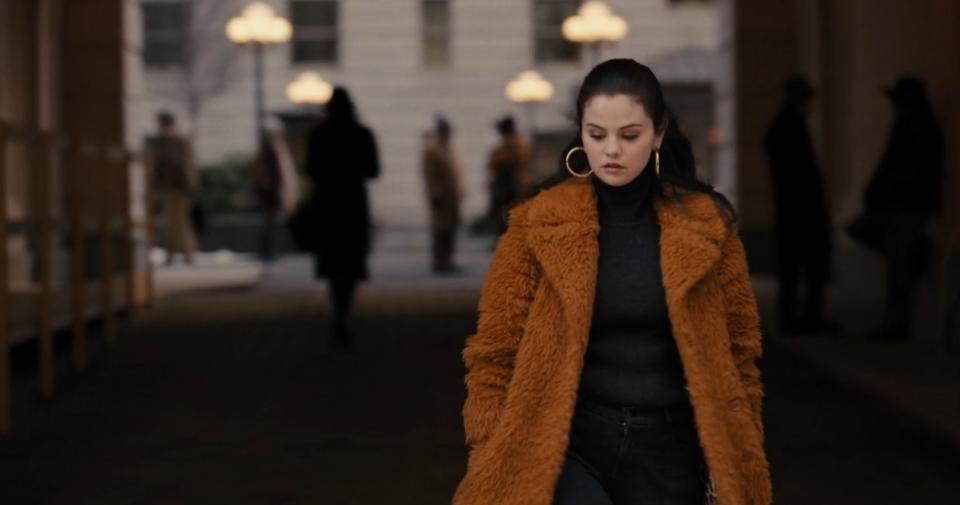 Mabel in orange fuzzy coat