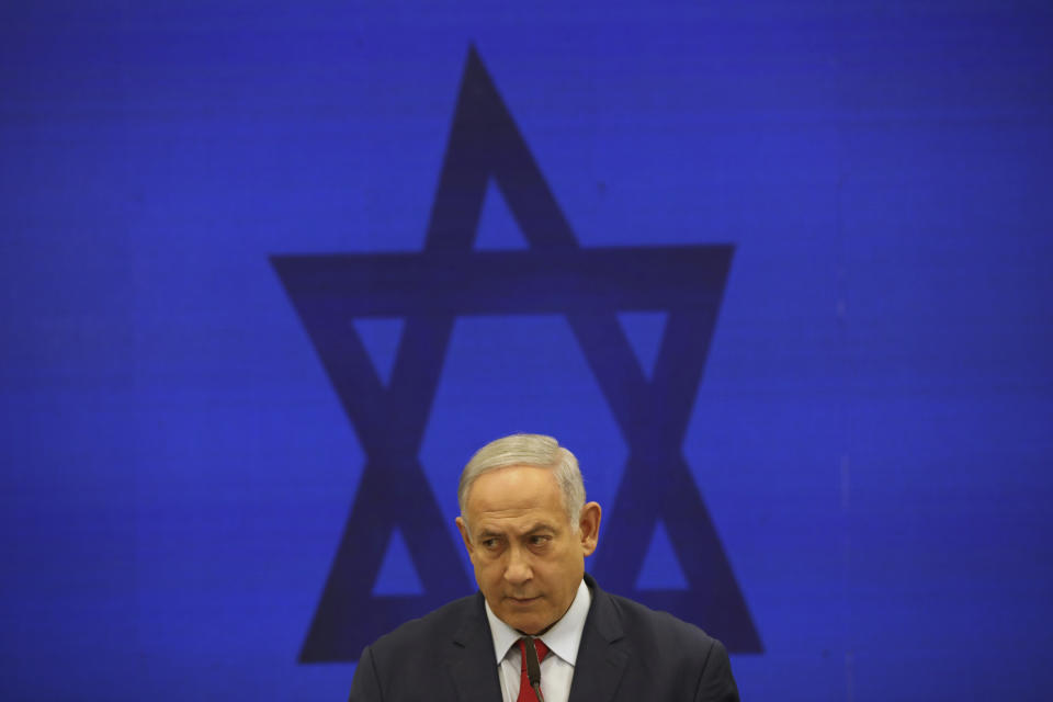 FILE - In this Tuesday, Sept. 10, 2019 file photo, Israeli Prime Minister Benjamin Netanyahu, speaks during a press conference in Tel Aviv, Israel. For the second time this year, Israel's long-serving Prime Minister faces off again against a former military chief, Benny Gantz, in national elections. Opinion polls show Netanyahu’s Likud and Gantz’s Blue and White locked in a close battle. (AP Photo/Oded Balilty, File)