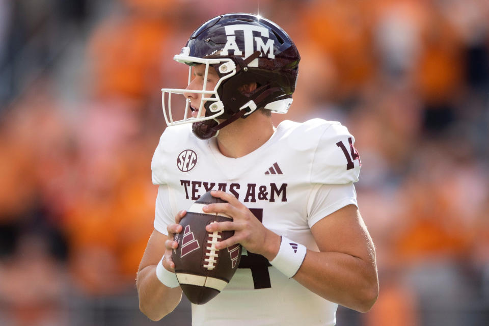 Oct 14, 2023; Knoxville, TN; Texas A&M quarterback Max Johnson (14) looks to pass during a football game between Tennessee and Texas A&M at Neyland Stadium in Knoxville, Tenn., on Saturday, Oct. 14, 2023. Brianna Paciorka-USA TODAY Sports