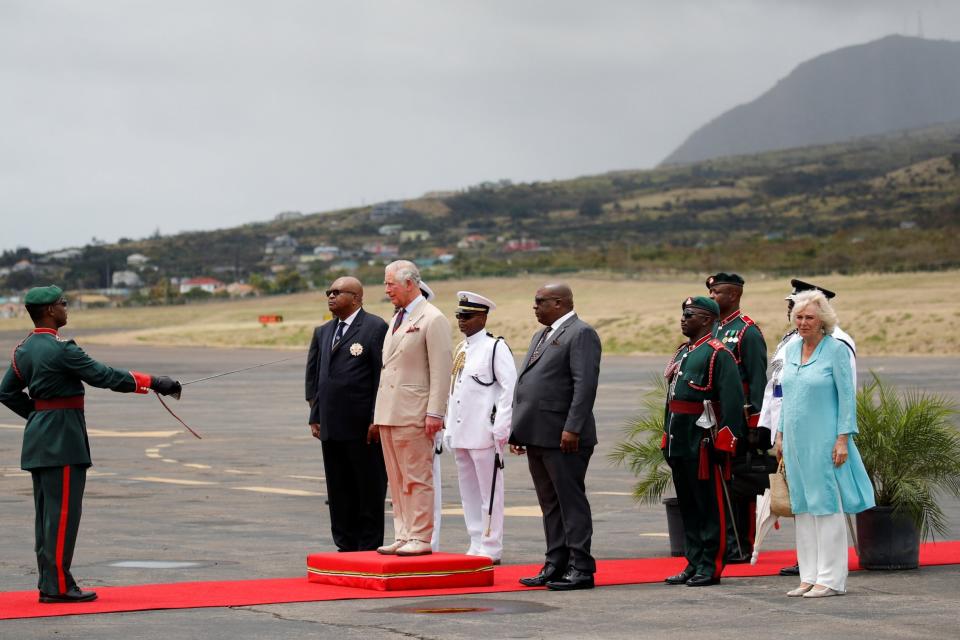 The couple were greeted with an official welcome ceremony after landing (REUTERS)