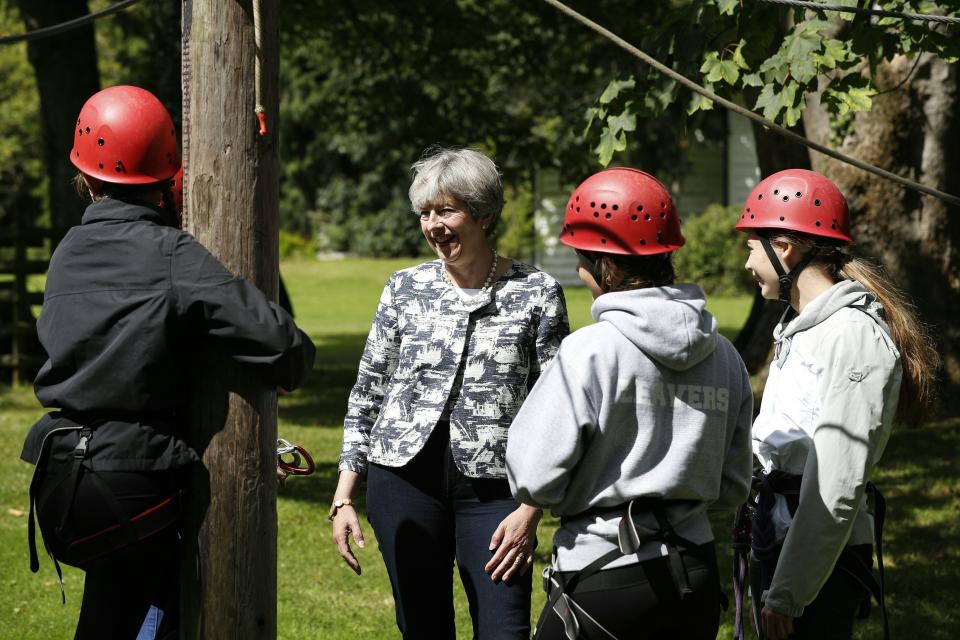 Theresa May helps unveil a new NCS course as prime minister in 2017PA