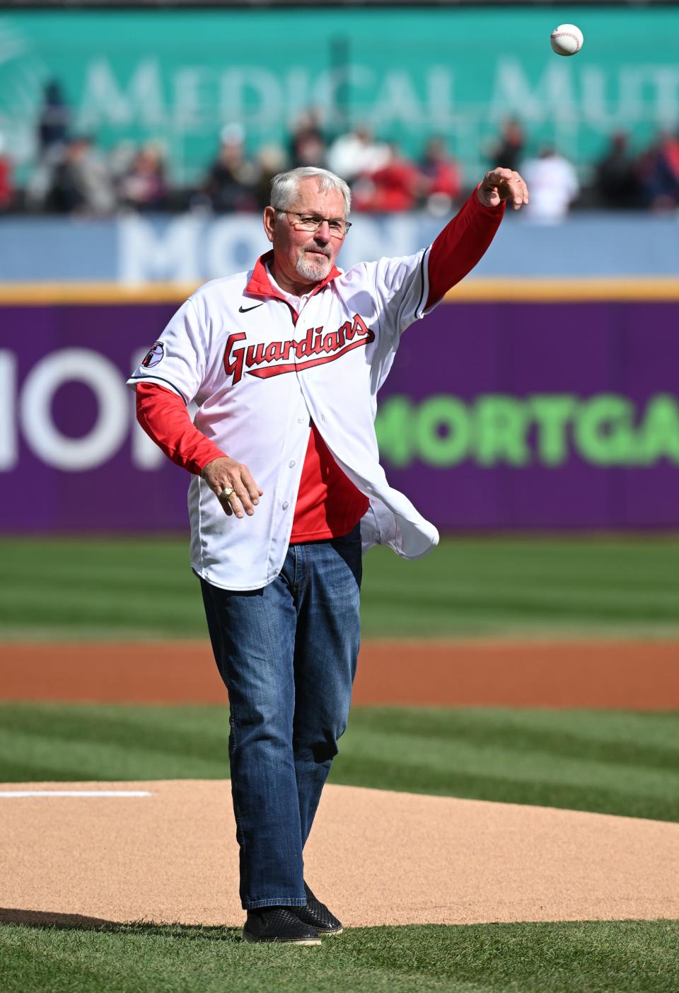 Former Cleveland manager Mike Hargrove throws out the first pitch before the start of Game 2 of the Guardians' 2022 wild card playoff series against the Tampa Bay Rays, in Cleveland.