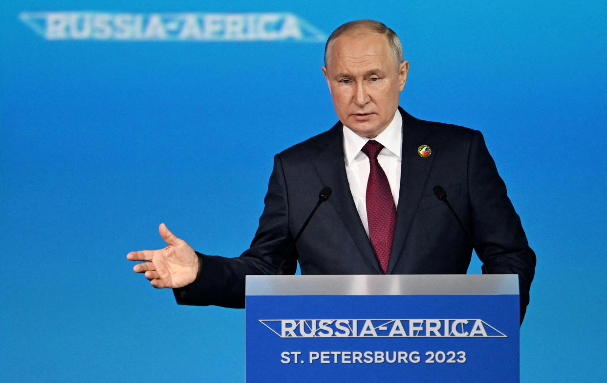 President Vladimir Putin at a podium marked Russia-Africa St. Petersburg 2023.