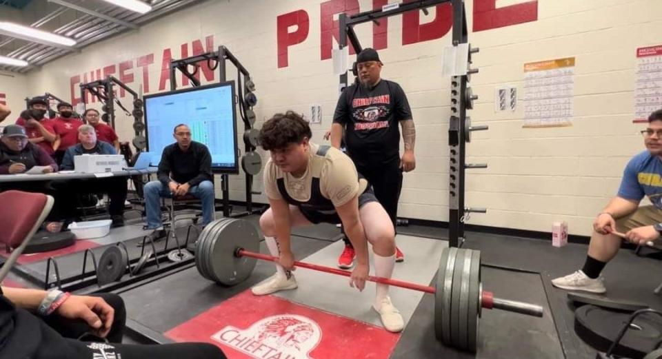 Navajo Prep's Dayton Yazzie competes in a powerlifting event Saturday, Feb. 11, 2023 at Shiprock High School.