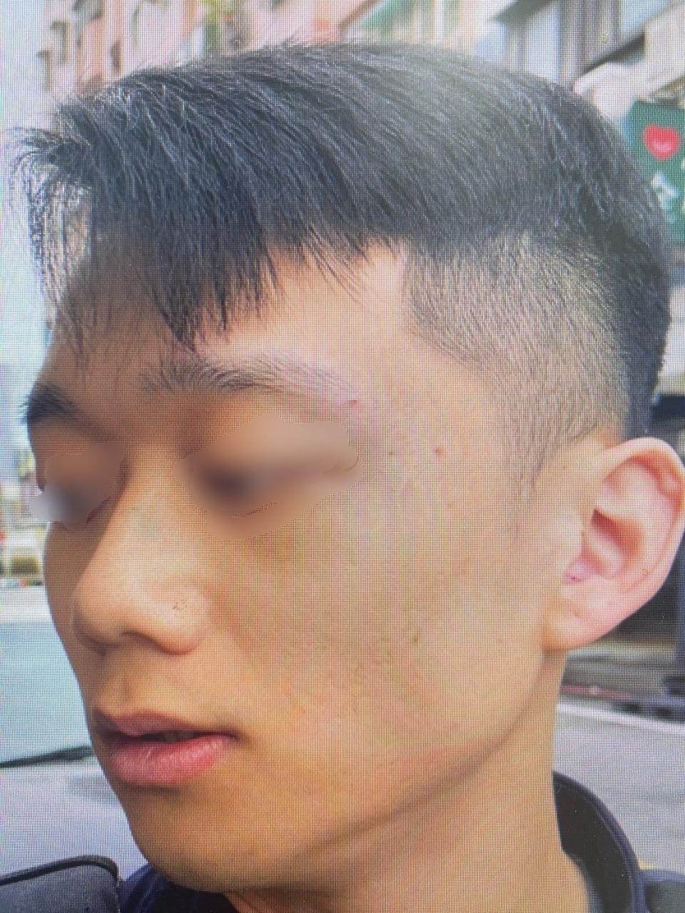 朱姓男子在超商內對警察出拳，一名警察腦震盪。民眾提供