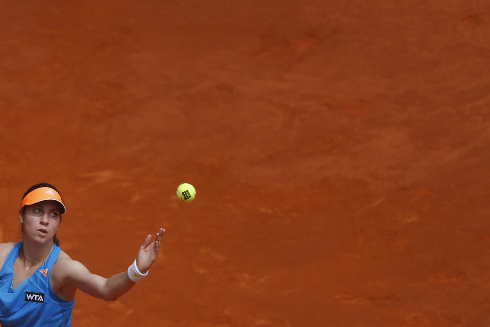 Christina McHale from US serves during a Madrid Open tennis tournament match against Maria Sharapova from Russia, in Madrid, Spain, Tuesday, May 6, 2014. (AP Photo/Andres Kudacki)