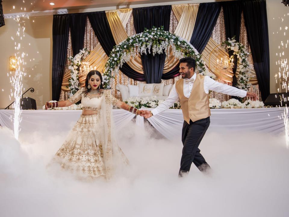 Ashley and Anil dancing at their wedding reception