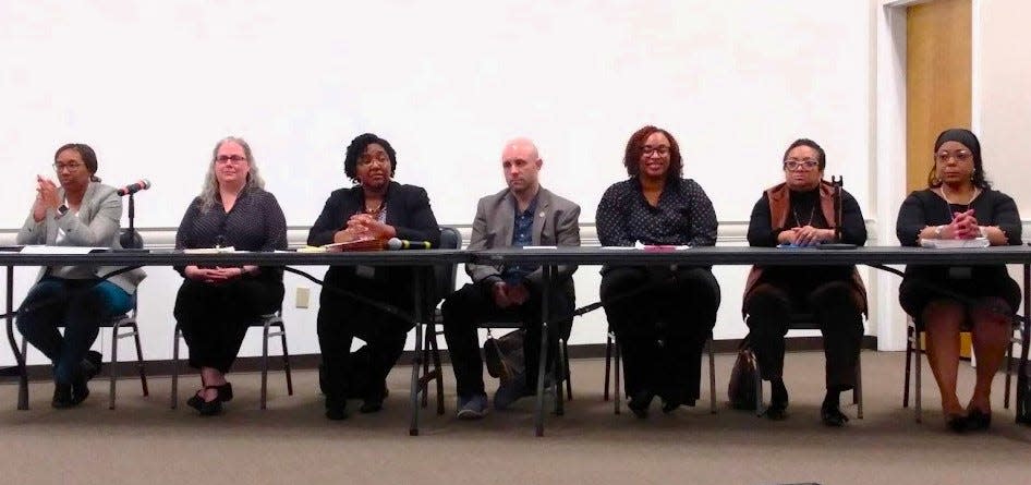 Guest panelists at the Feb. 20 Town Hall Meeting, each representing different divisions of the Mississippi Department of Human Services, included, from left, Kristi Kinnel, Lora Tatum, Denise Wesley, Chad Algood, Kenyada Blake-Washington, Tina Ruffin and Toni Kersh.