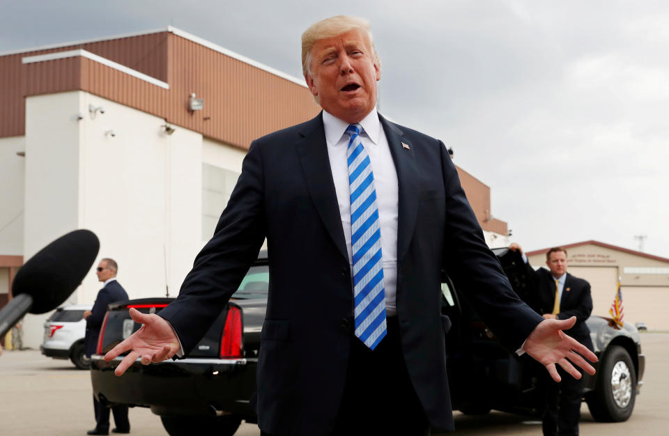 President Donald Trump is trying to deflect from his lawyer implicating him in felony campaign finance law violations by talking about an unrelated fine the 2008 Obama campaign received. (Photo: Leah Millis / Reuters)