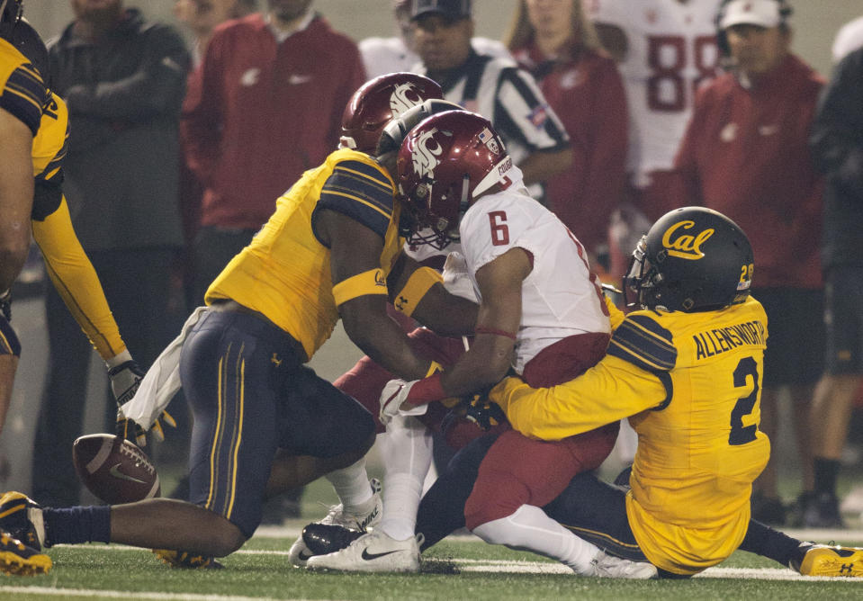 Washington State’s Jamire Calvin (6) fumbles during the first quarter of an NCAA college football game against California, Friday, Oct. 13, 2017, in Berkeley, Calif. California recovered the ball. (AP Photo/D. Ross Cameron)