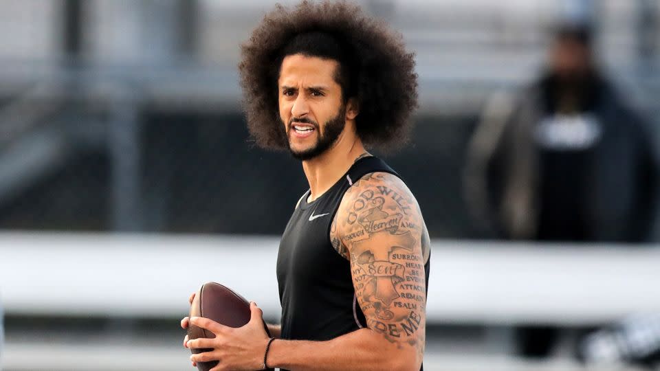 Deion Sanders' outspokenness may remind some of former NFL quarterback Colin Kaepernick, who has been out of football since leading on-field protests against police brutality and racial inequality before NFL games during the 2016 season. - Carmen Mandato/Getty Images