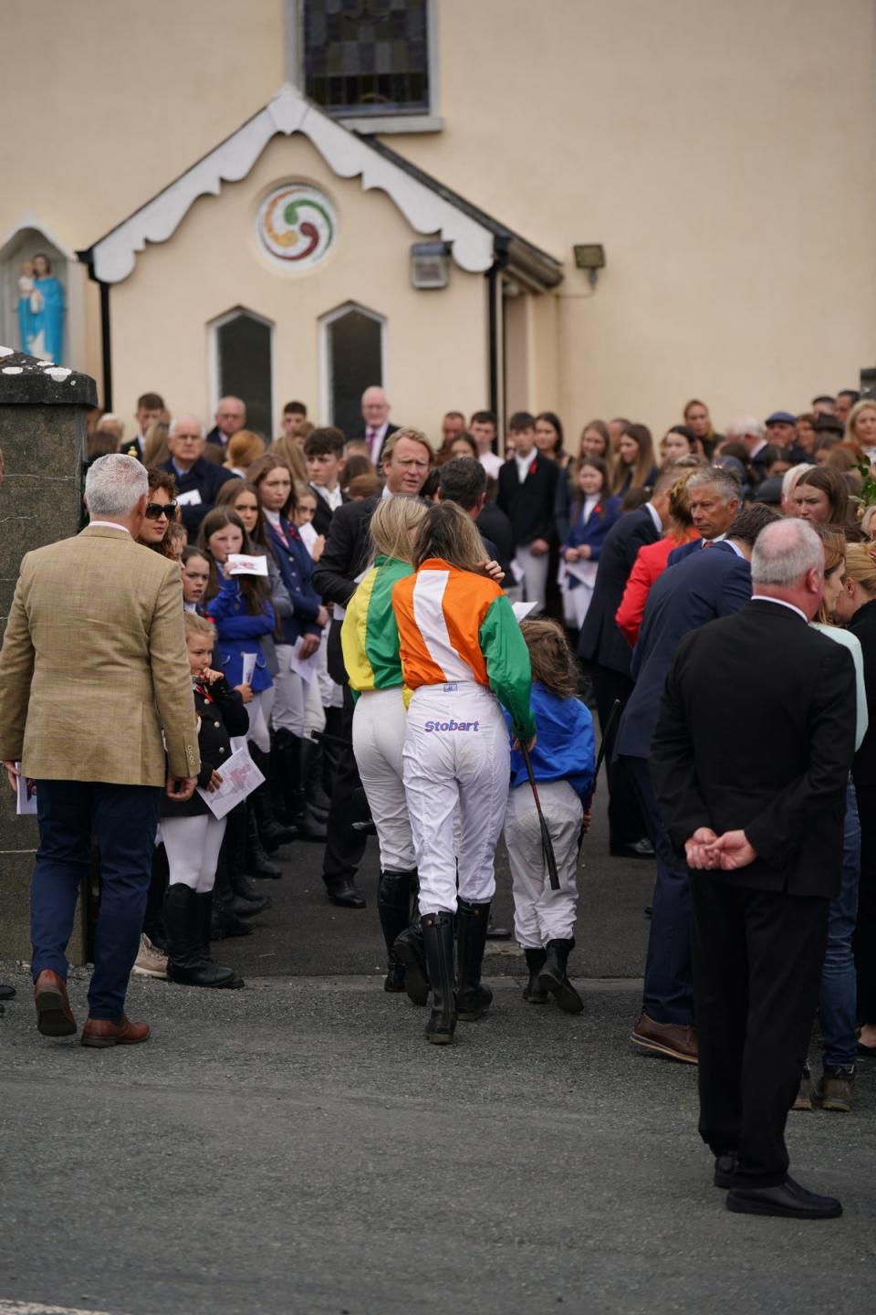 Young jockeys arrive for the funeral of Jack de Bromhead (Niall Carson/PA) (PA Wire)