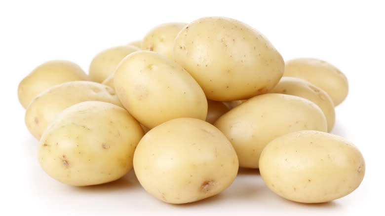 white potatoes on white background