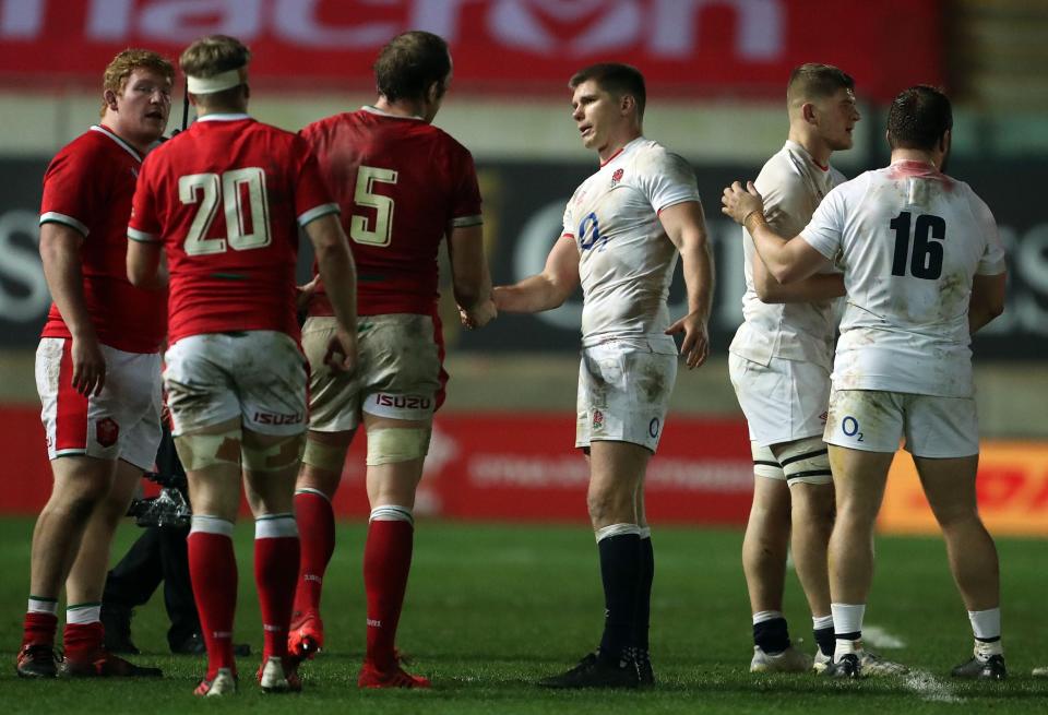 England captain Owen Farrell congratulates Wales’ players after a close matchAFP via Getty Images