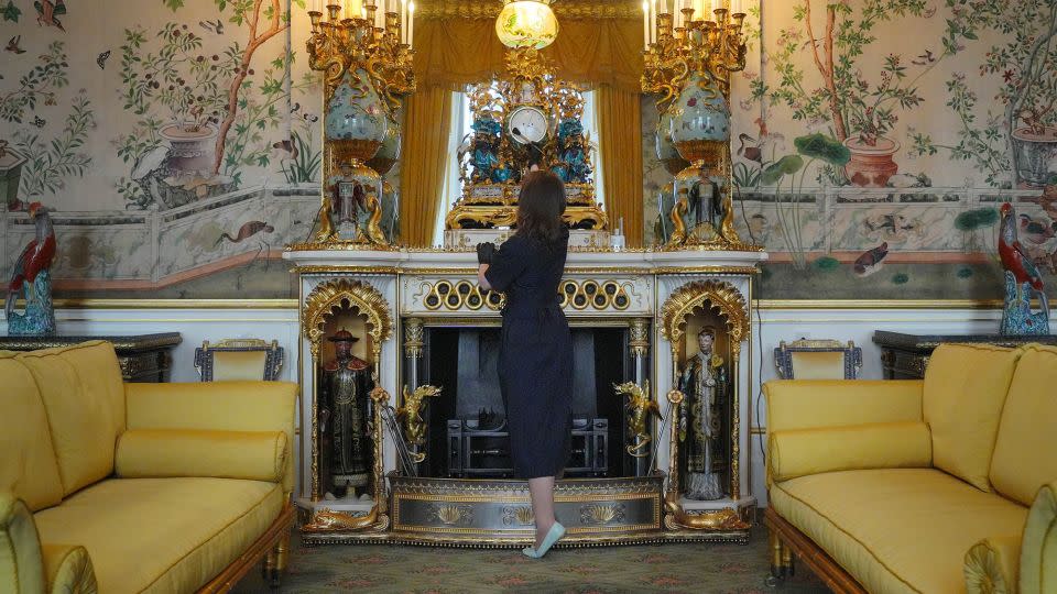 Final preparations are made in the Yellow Drawing Room. - Jonathan Brady/PA