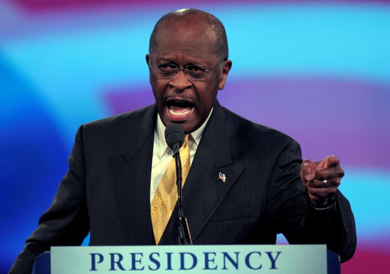 FILE PHOTO: U.S. presidential candidate Herman Cain speaks to delegates during the Republican Party of Florida Presidency 5 Convention in Orlando