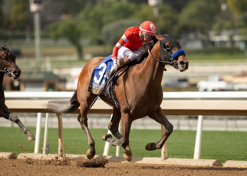 Practical Move and jockey Ramon Vazquez win the San Felipe on March 4 at Santa Anita Park.