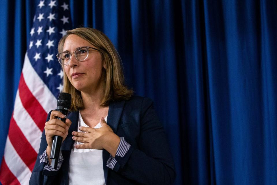 Hillary Scholten, the democratic candidate for Michigan's 3rd Congressional District, speaks to a crowd of supporters during a canvassing event ahead of the upcoming Nov. 8th election Friday, Nov. 4, 2022, in Grand Rapids. 