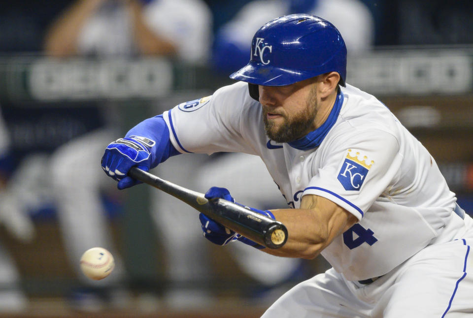 Kansas City Royals' Alex Gordon bunts during the third inning of a baseball game against the Pittsburgh Pirates in Kansas City, Mo., Saturday, Sept. 12, 2020. (AP Photo/Reed Hoffmann)