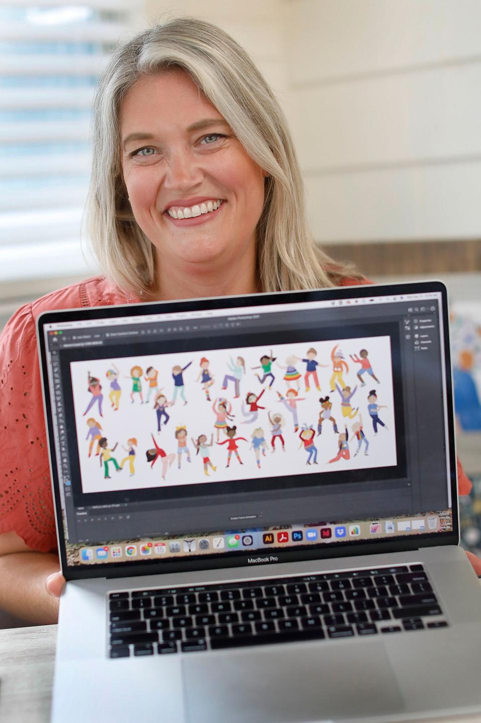 Graphic artist and illustrator Molly Fabiano of Braintree uses her computer and tablet to create whimsical characters she hopes to someday publish in a children's book.