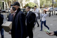 Retired German tennis star Boris Becker leaves Westminster Magistrates Court in London, after being declared bankrupt and accused of not complying with obligations to disclose information, Thursday, Sept. 24, 2020. Becker is being prosecuted by the Insolvency Service. (AP Photo/Matt Dunham)