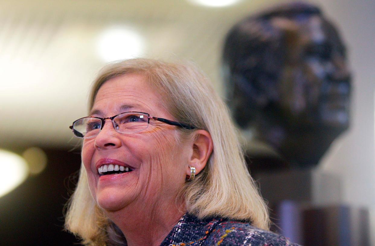 Cissy Baker, daughter of U.S. Sen. Howard Baker Jr., speaks in front a bust of her father before a luncheon at the Baker Center March 13, 2015, in Knoxville.