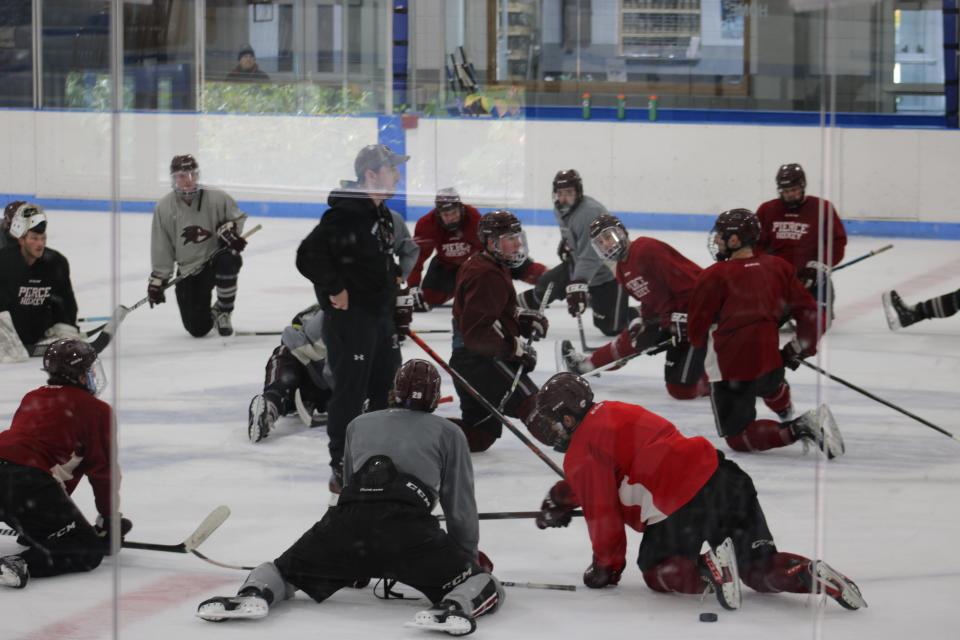 Joshua Fusco took over as head coach of the Franklin Pierce men's hockey team for the 2023-24 season. Fusco talks to the team in between drills at a practice on Oct. 11, 2023.