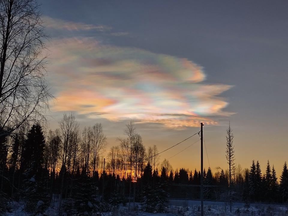 rainbow colored clouds in the sky.