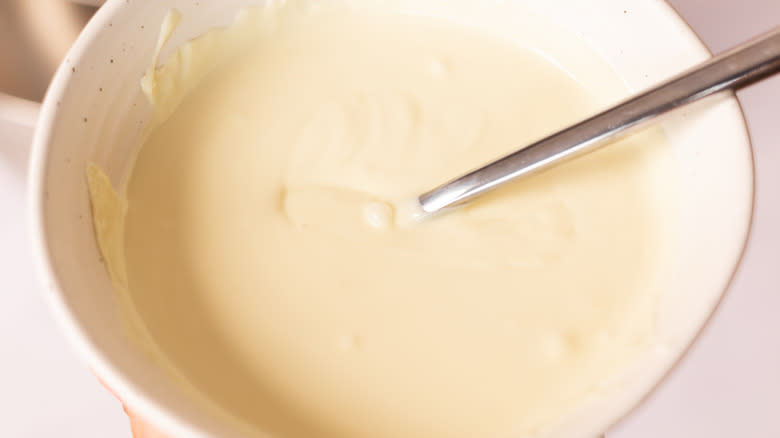 melted white chocolate in bowl 