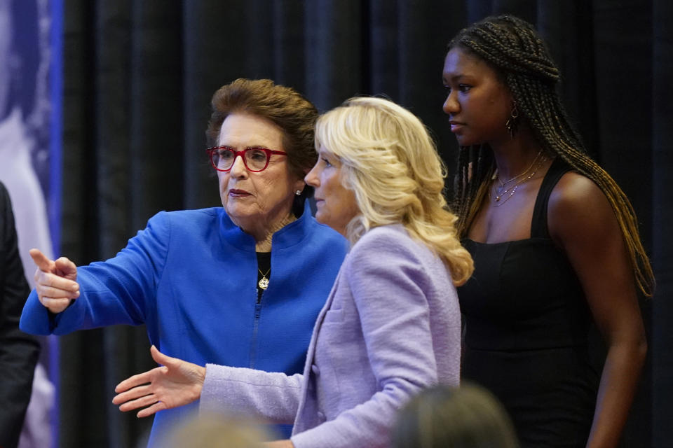 Tennis great Billie Jean King, from left, first lady Jill Biden and student-athlete Maya Mosley greet attendees after speaking at an event to celebrate the 10th anniversary of the State Department-espnW Global Sports Mentoring Program and the 50th anniversary of Title IX, Wednesday, June 22, 2022, in Washington. (AP Photo/Patrick Semansky)