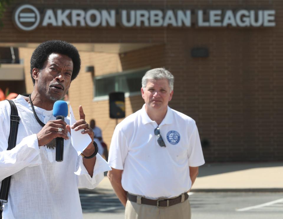 Akron Council member Russ Neal, Ward 4, address the attendees at the Innerbelt Reunion at the Akron Urban League in Akron on Sunday.