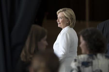 Democratic presidential candidate Hillary Clinton leaves after talking about her strategy for rural America during a campaign stop at the FFA Enrichment Center at the Des Moines Area Community College in Ankeny, Iowa , August 26, 2015. REUTERS/Scott Morgan