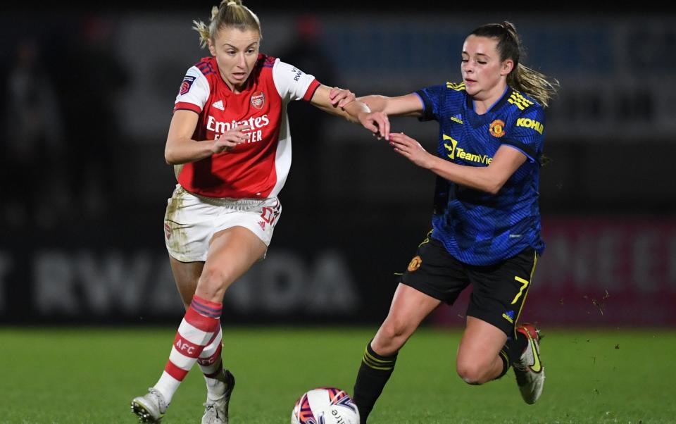 Leah Williamson of Arsenal takes on Ella Toone of Man Utd during the FA Women's Continental Tyres League Cup Quarter Final between Arsenal Women and Manchester United Women - Getty Images