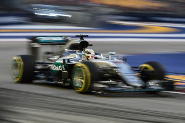 Mercedes AMG Petronas F1 Team's British driver Lewis Hamilton takes a corner during a practice session in Singapore, on September 16, 2016